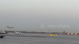 Arrival of Qatar Airways B777-300 landing at Hamad International Airport