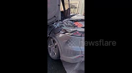 Motorists miraculously survive as 49-tonne coal truck crushes car in China