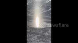 Rare Tyndall effect astonishes visitors at northwestern China ski resort