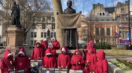 International Women's Day: Women wearing The Handmaid's Tale protest in London in support of freedom for Iran