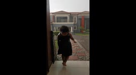 Playing And Slipping In The Rain