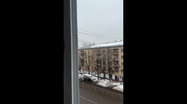 Close call in Khimki: snowfall on bus stop roof saves people below