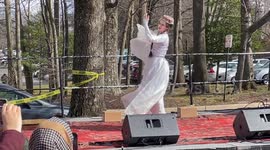 Second woman performing traditional dance at 10th Annual Nowruz Festival (Persian New Year celebration)