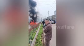 River surface catches fire after passerby tosses cigarette butt inside without knowing itcontained petrol discharge