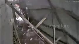 Canopy collapses second after mother and son step inside house in China