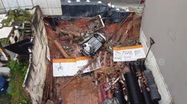 Heavy rain knocks down cemetery wall and subway construction site in Sao Paulo, Brazil