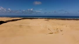 Adventure Unleashed: Would you surf these giant sand dunes on a boogie board - Te Paki Sand Dunes Surfing in New Zealand's far North