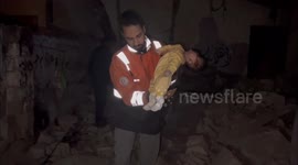 Palestinian civil defence crews recover bodies after Israeli attack in Gaza
