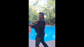 Mariachi band member tumbles into pool during performance in Mexico