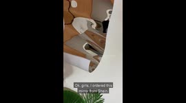 Woman in hysterics after mirror she ordered online is one from a funhouse