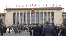 Int'l observers on China's whole-process people's democracy