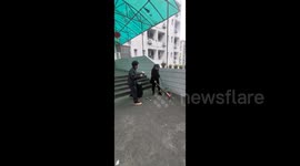 College graduate says goodbye to his dormitory host manager in Chongqing, China