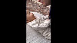 Chinese Baby Nearly Speaks in Fiercely Refusing Uncle's Kisses