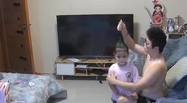 Father shows off quick ponytail hack for daughter before school