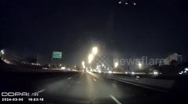 Shooting star illuminates night sky over central Thailand