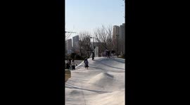 Skateboarder takes unexpected bush dive in China