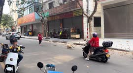 Dog owner left flat on their face attempting to chase runaway corgi in China