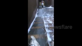 Descent Down Icy Stairs in Shandong, China