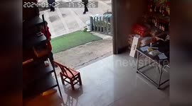 Woman nearly engulfed by flames while attempting to toss out burning pan