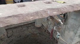 Fearless 70-year-old is lowered into 100-foot-deep well to rescue cow in central India