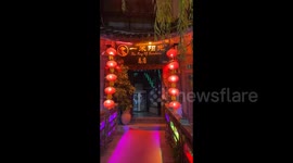 Tourists Visit The Old Town of Lijiang at Night in China