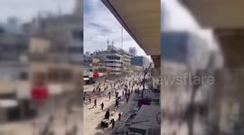 Locals rush to newly airdropped aid in Gaza City