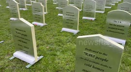 Greenpeace build a “cemetery” from insulation boards outside UK Parliament warning the government’s failure to insulate homes costs lives