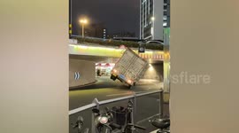 Cargo truck stuck in underpass bridge in China