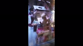 Chinese restaurant staff dodge injury as hotpot explodes from diner's lighter toss