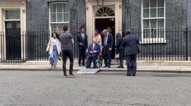 Texas governor Greg Abbott poses for a memorable picture outside 10 Downing Street