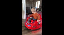 One-Year-Old Nods Off While Driving Toy Car