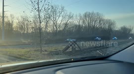 Police Chase Pickup Truck and Trailer Onto Train Tracks