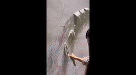 Talented Artist Crafts Spectacular Great Wall Relief Sculpture in China
