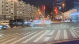 Quick-Thinking Motorist Dodges Near Collision on Electric Scooter in China