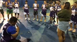 Boyfriend fakes basketball game injury to make surprise proposal to partner