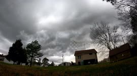 A Spring Thunderstorm In Paducah, Kentucky Ominously Lurks Over A Home