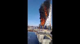 Powerful fire engulfs unfinished high-rise in city north of Moscow