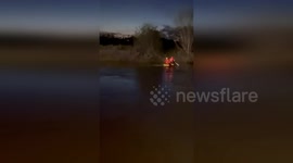 Firefighters rescue shepherd dog trapped by strong current in river