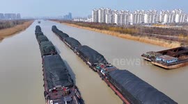 Cargo Ships Across the Beijing-Hangzhou Grand Canal in Huaian, China