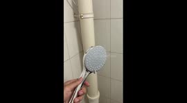 Bizarre showerhead squirts water instead of sprinkling it at home in China