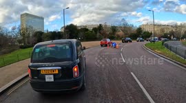 Police called after London Cab Driver is caught on his phone and tries to steal the cyclist's GoPro action camera