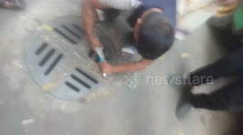 Rescuing a Dog Stuck in a Manhole