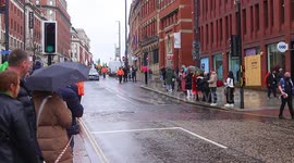 Crowds gather for annual St Patricks Day Parade in Leeds City Centre, UK