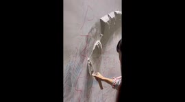 Chinese artist crafts spectacular wall relief sculpture depicting Great Wall
