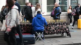 Selling some gold outside Camden Market, London, United Kingdom