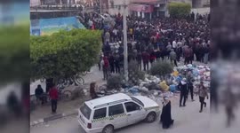 Gazans Line Up for Food Aid