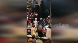 Activists Disrupt Theater Performance to Protest Unfair Charges Amid Climate Crisis