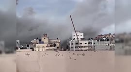 Israeli bombard residential areas surrounding al-Shifa Hospital in Gaza