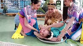 Dancers twist into incredible positions for traditional Thai performance