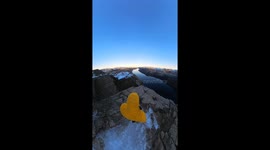 Don't look down! Daredevil poses on edge of huge mountain in Norway